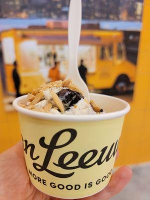 Cookies and cream with sliver sweetened almonds added topping for Tuesday free topping Day after a Yelp event next door