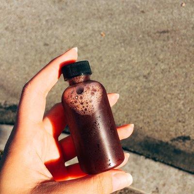 Tart cherry + turmeric health shot.