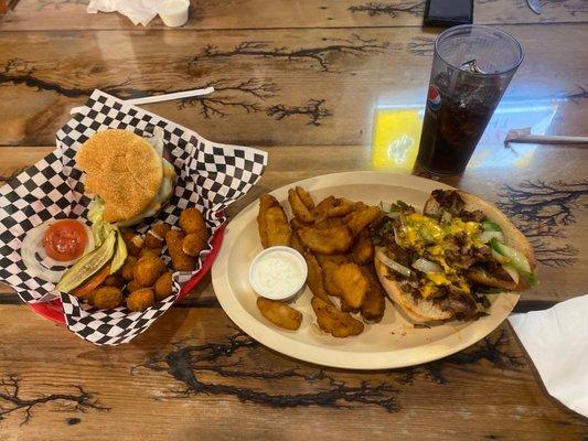 Pastrami burger with spicy cheese curds, Philly cheesesteak with onion petals