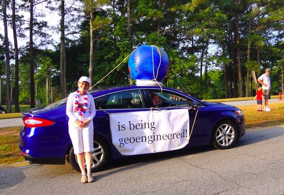 Mary Hollowell & her father alert 10,000 spectators to  geoengineering on July 4th, 16, in Peachtree City, GA  geoengineering watch  dot org