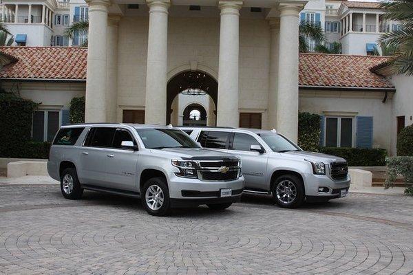 A fleet filled with luxury SUVs that seat up to 6 passengers comfortably.