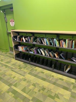 Mostly cardboard books in the toddler area, like it!