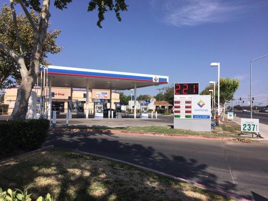 Look--9/4/2016:  If Costco ($2.25 regular gas per gallon) is closed on Labor Day, this is the least expensive at $2.21 per gallon.