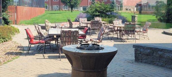 Outdoor seating area between the guest rooms and the conference center.