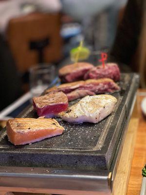 Sizzling steak stone dinner with choice of 10 proteins