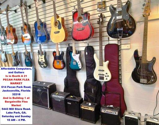 Affordable computers and guitars Is in booth a 21 Pecan park flea market 614 pecan park road, Jacksonville, Florida 32218 .