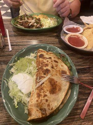 big quesadilla texana filled with shrimp chicken and steak