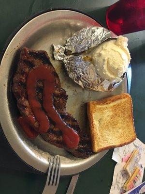 Steak, baked potato, and TX toast - this kept me alive to fight another day!