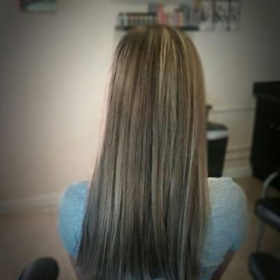 Some highlights added to this beautiful natual brunette to brighten and break up her look.