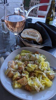 Caesar half salad $6, glass of white zinfandel $7