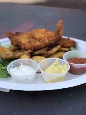 Fried chicken with home made potatoes and three scrumptious sauces.