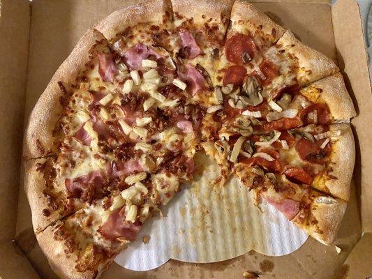 XL pizza (half pineapple ham and bacon/half pepperoni mushroom and onion) - 12 slices. 12 very unevenly cut slices.