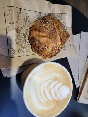 Omelet stuffed croissant and cappuccino