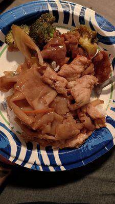 Plated delivery order: beef with garlic and chicken ho fun on rice. YUM!