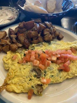 Spinach & mushroom Omelette with hash browns