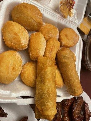 Fried donuts and pork egg rolls