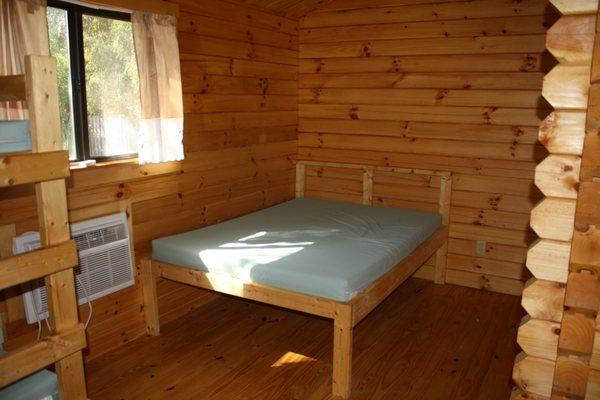 Cabins sleep 4. Bunk beds and a double bed. A/C and heat.