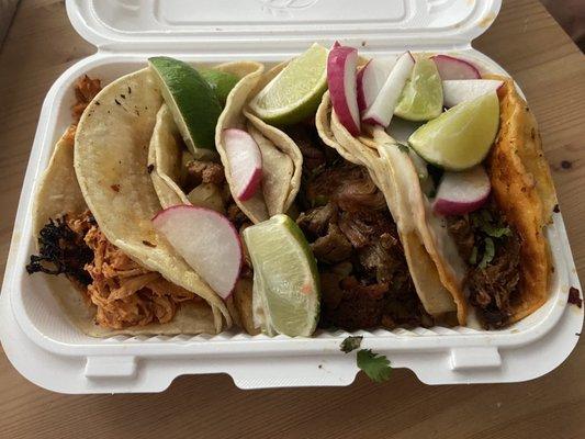 Left to right: chicken tinga, Al pastor, carnitas, birria