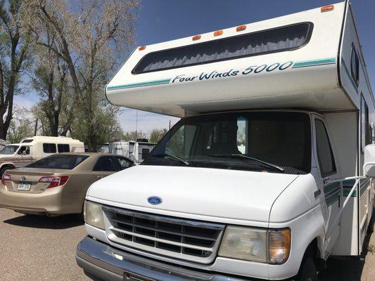 RV from J and L A C. Leaks into roof dash ac leaks into floor board , and refrigerator went out . Lies all lies