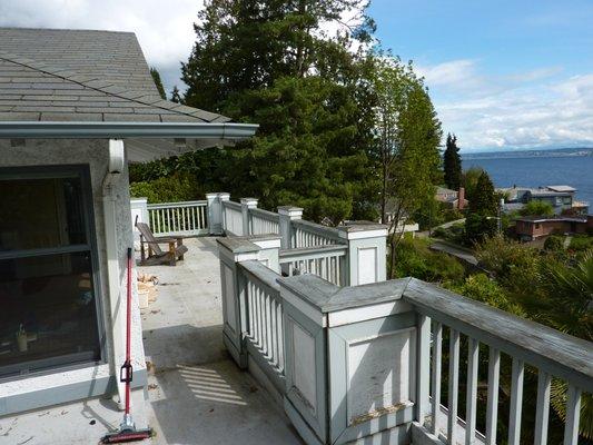 Before balcony railing restoration - involving both carpentry and painting