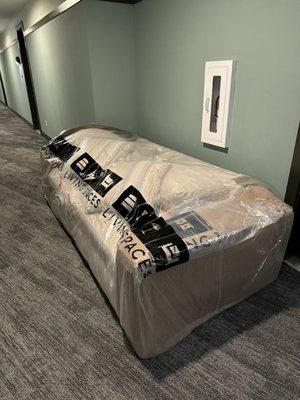 Couch Left In Third Floor Hallway