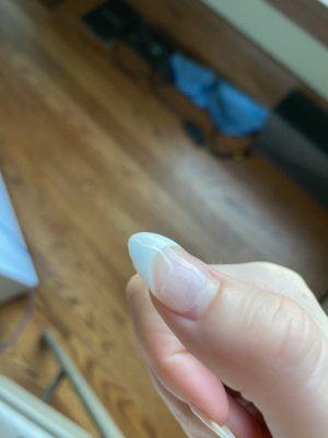 This is the nail that started peeling it's top coat after 2 weeks.