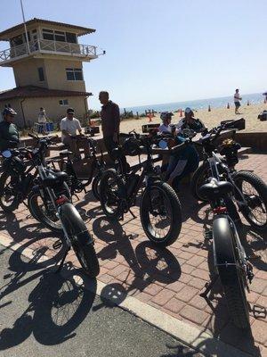 Rad power bike group at the beach.