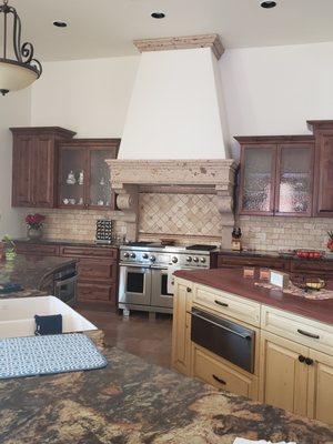 Cantera oven hood.  They even built the chimney popouts.