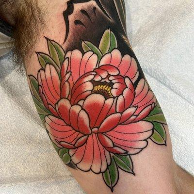 Peony tattoo. Done by Tommy Tingle.