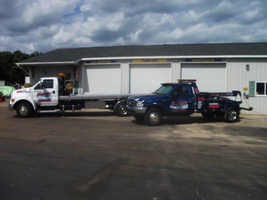 OFFER TOWING SERVICE.  REPAIR, RECOVERY, SCRAP