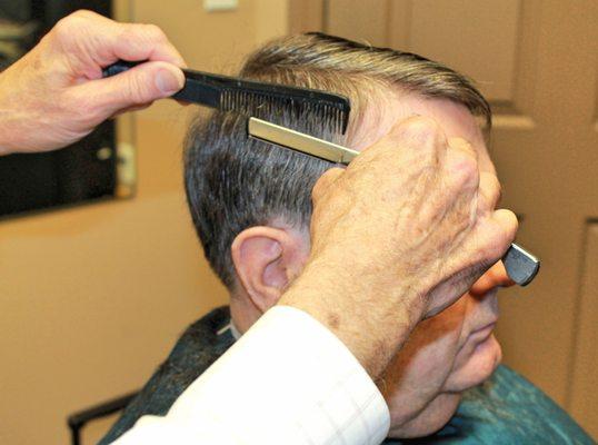 Razor cuts are done by our barber Marshall Taylor, call today to book an appointment.