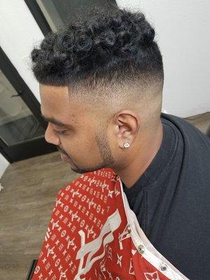 Curly top w/bald fade and chin strap beard