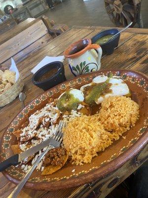 Chilaquiles rojo with chorizo added and their red and green salsa  (no beans extra rice also my ask)