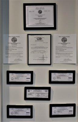 This is the first photo of the licenses on the wall as you enter.  Photo taken February 5, 2021.