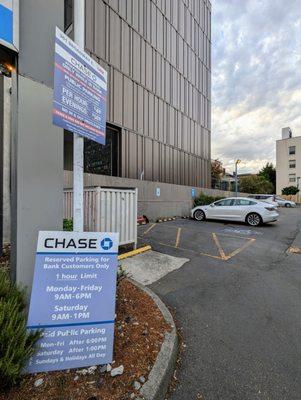 Parking lot. We parked in the Chase Bank lot at 301 Broadway E. Hours and rates shown in photo.