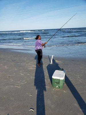 Fishing on the beach.