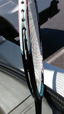 Badminton racket stringing. Got at least 3 places where strings overlapping each other outside the frame. Very bad stringing quality.