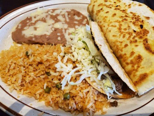 $8.99  Combination 6 - BEEF TACO, ONE GRILLED CHICKEN QUESADILLA, RICE AND BEANS