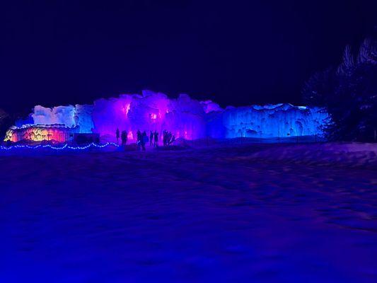 Walking up to the ice castle at night