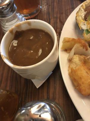 Gravy cup presented like slop. So salty even I couldn't eat it.