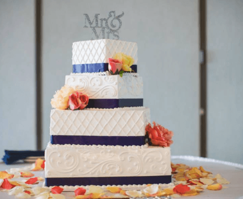 Wedding cake by Wild Flour Bakery- included in packages.