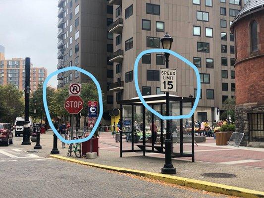 No U-turn signed blocked by Speed Limit sign