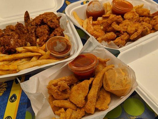 Fish Strips with Cajun Tartar Sauce, Foxy Emma and Mae Frencis (fried shrimp and fries), Big Boy Bird (BBQ wings)