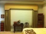 Padded cornice with side panels. Also a motorized shade. We specialize is motorzation.