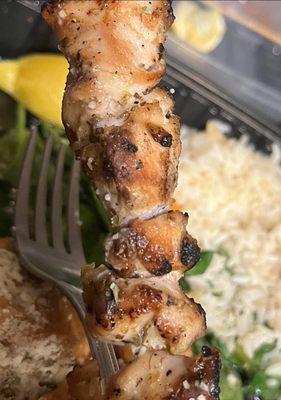 Cold, reheated chicken souvlaki. Hard as a rock on the outside. Dried up.