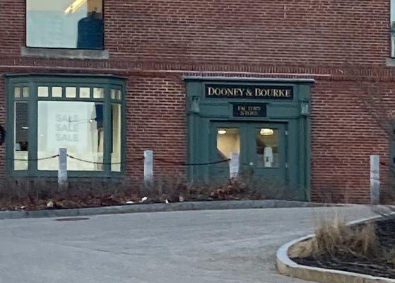 According to an employee..."Dooney & Burke doesn't allow pictures of their storefronts to be posted online."