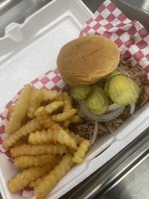 Brisket Sandwich with Fries.