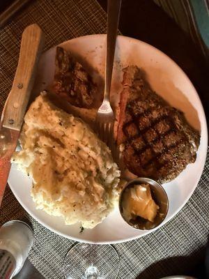 My brother had already cut the steak before i snapped picture. Generous mashed potatoes!