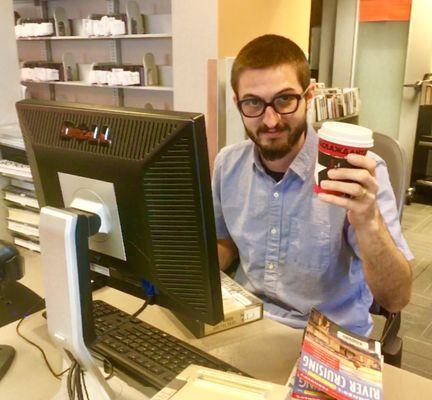 Tony, DPL librarian, hard at work in the Ross Cherry Creek Branch