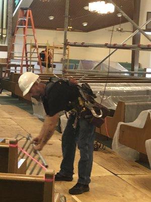 Erecting Scaffolding for Church Mold Remediation